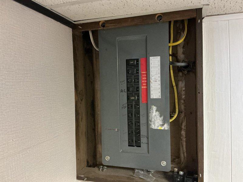 Conducted electrical estimate for 240V hot tub installation at residential property. Assessed existing electrical infrastructure including main panel location in interior wall cavity and available exterior access points near HVAC equipment and deck area. Documented current electrical service capacity, panel configuration with existing circuit breakers, and optimal routing path for new dedicated 240V circuit from panel to proposed hot tub location on deck.