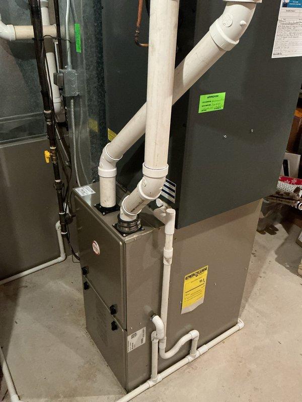 Completed annual cooling maintenance on 11-year-old EnergiAir system with condenser manufactured in 2020. Performed comprehensive inspection of air handler and condensate drainage system. Verified proper operation of all electrical connections, refrigerant lines, and PVC condensate piping. Inspected interior components including blower assembly, evaporator coil access area, and control wiring. Documented system condition with photos showing normal wear for age. All components operating within specifications with no immediate service needs identified.