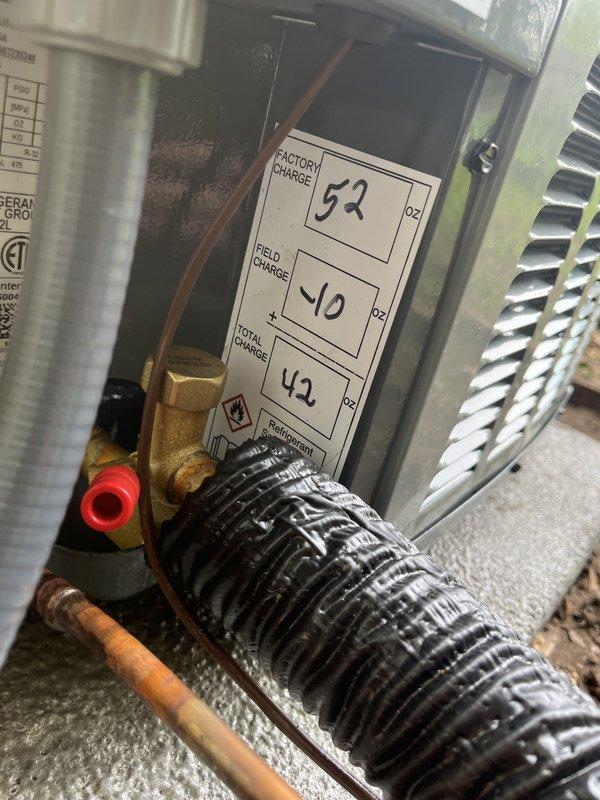 Successfully completed a comprehensive HVAC and water heater installation in residential basement. Installed new Bradford White water heater with complete copper piping configuration, brass fittings, and pressure relief valve assembly connected to existing plumbing system. Added new air conditioning system with outdoor condensing unit, properly charged with refrigerant to manufacturer specifications (factory charge 52 oz, field charge 40 oz, total system charge 42 oz), including copper refrigerant line set with brass service valves and heat exchanger coil installation. Installed new furnace unit integrated with AC system for complete climate control solution. All equipment mounted, leveled, and secured per code requirements. Verified proper refrigerant charging, tested all electrical connections, and confirmed operational functionality of heating, cooling, and hot water systems.