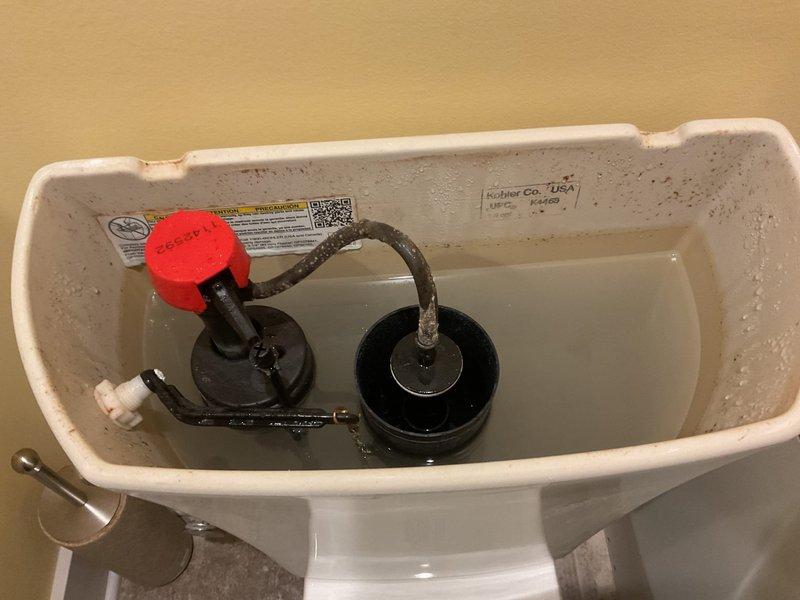 Responded to callback for toilet randomly running issue. Upon inspection, examined tank components including Fluidmaster fill valve and flapper assembly with chain connection. Verified proper operation of flush mechanism and adjusted chain tension to prevent intermittent running. Tested flush cycle multiple times to confirm resolution of random running condition.