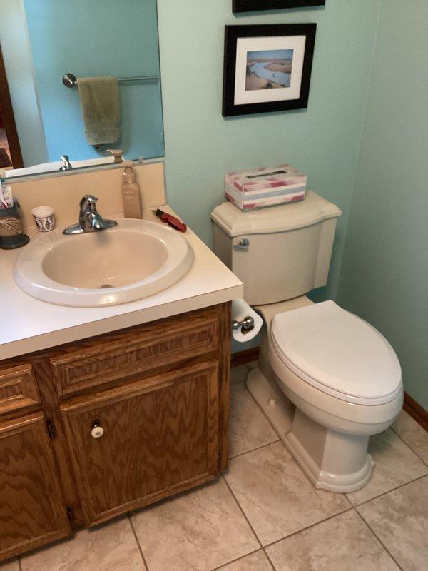 Responded to service call for broken toilet seat in residential bathroom. Replaced damaged toilet seat with new unit, ensuring proper installation and secure mounting. Additionally inspected kitchen faucet as requested, checking for leaks, water pressure, and operational functionality; faucet found to be in good working condition with no issues detected.