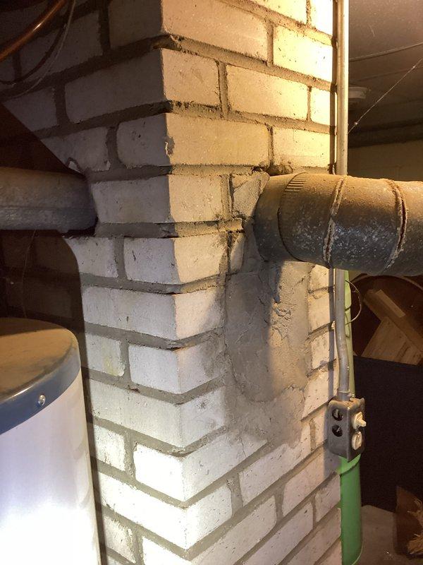 Responded to service call for drastically reduced water pressure at property with 25-year-old Rheem water heater. Performed diagnostic inspection of water heater and associated plumbing connections, documenting existing conditions including corroded gas line with visible rust and aging mechanical infrastructure. Identified pressure issue and provided assessment of system components requiring attention.