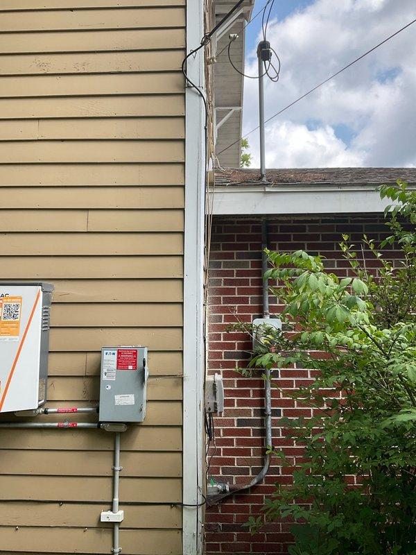 Responded to electrical panel service request at newly purchased residential property. Performed comprehensive inspection of main electrical panel located in basement utility area above HVAC equipment. Panel exhibited warning labels and multiple circuit connections requiring evaluation. Assessed electrical meter installation and exterior service connection point to verify proper utility interface. Documented existing panel configuration, wiring conditions, and compliance considerations for homeowner's reference. Provided recommendations for panel maintenance and potential upgrades to meet current electrical safety standards.