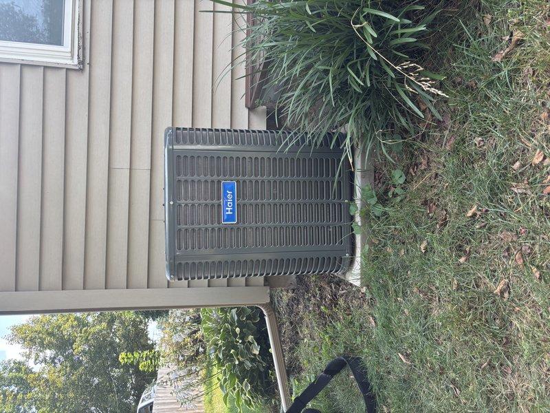 Performed annual cooling maintenance on 25-year-old ComfortStar AC-18248 outdoor condensing unit with 053 piston. Responded to no-cooling complaint and conducted comprehensive system inspection. Verified unit operation, checked refrigerant charge levels, inspected electrical connections, and cleaned condenser coils. Confirmed best contact number and notified customer of arrival time adjustment. Documented equipment condition with photos showing unit installed on concrete pad adjacent to building with proper clearances maintained.