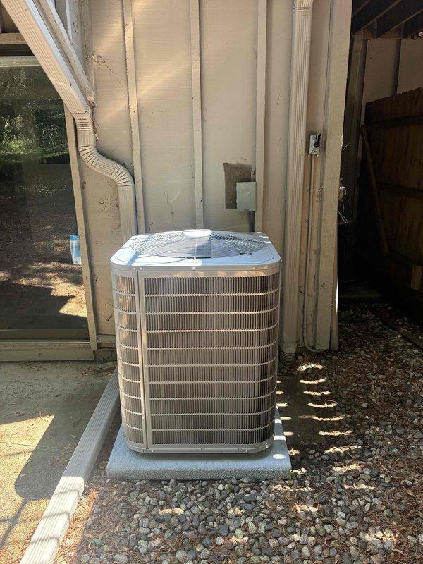 Completed full HVAC system replacement including installation of new Carrier furnace unit in basement mechanical room and outdoor condenser unit. Mounted furnace on concrete floor against foundation wall with proper clearances, connected metallic supply ductwork and sheet metal plenum to distribution system, and ran gas lines and electrical conduit per code requirements. Installed outdoor condenser on level concrete pad with appropriate gravel base, positioned unit away from building exterior to ensure adequate airflow, and completed refrigerant line set connections with PVC drainage piping routed along exterior wall. Verified all electrical connections, tested system operation, and confirmed proper airflow throughout ductwork system.