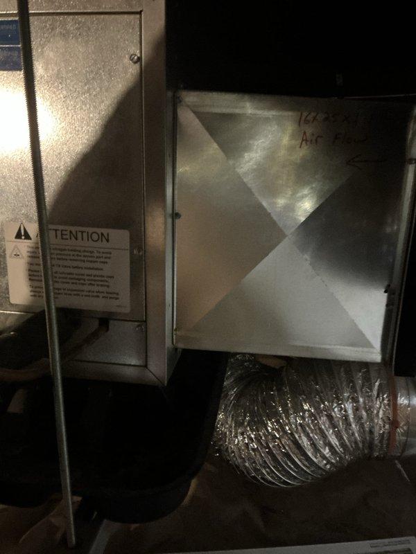 Performed Sales-ESTA-AC Estimate for residential HVAC system experiencing inadequate cooling with continuous fan operation but insufficient cold air output. System age estimated at 10-15 years based on visual inspection. Accessed attic-mounted air handling unit and associated ductwork to assess equipment condition and identify cooling deficiency causes. Documented existing installation including metal air handler housing, plenum connections, and flexible aluminum duct routing throughout attic space. Photographed equipment configuration, warning labels, and overall system layout for estimate preparation and customer consultation regarding repair versus replacement options.