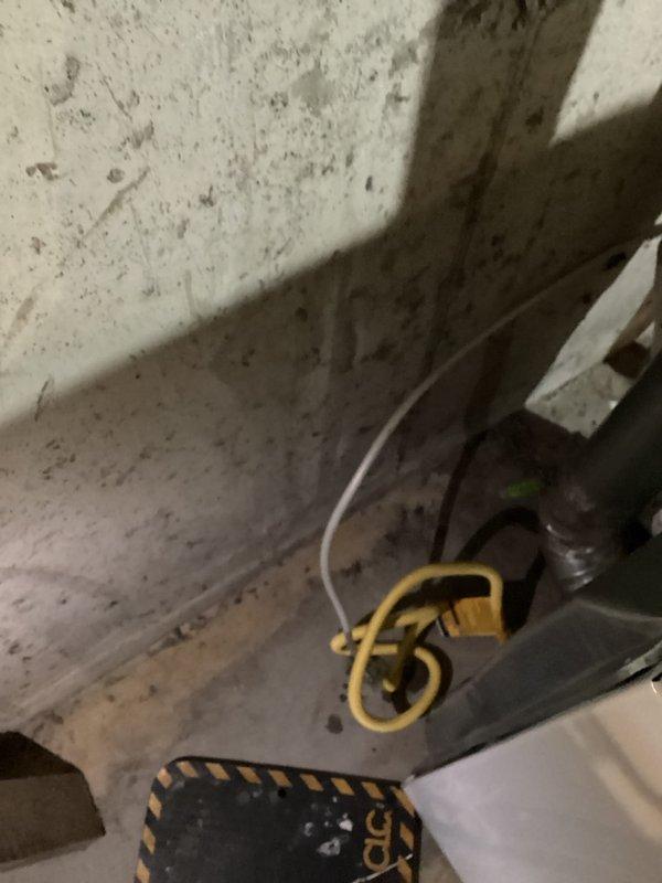 Relocated shut off valve to position closer to dryer to facilitate proper connection of new appliance. Work completed on customer wait basis, with documentation photos taken of work area showing utility space conditions before service completion.