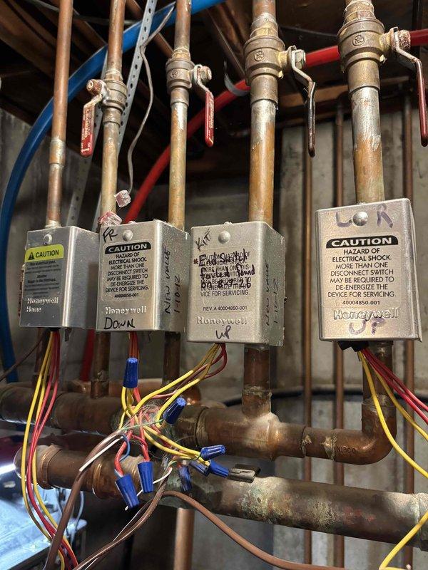 Performed boiler repair on a Navien wall-mounted unit during a 4-hour service call. Accessed internal components by removing the front cover to diagnose and address system issues. Inspected heat exchanger assembly, blower motor, circuit boards, wiring harnesses, pumps, sensors, and control modules. Serviced multiple zone valves with associated Honeywell control boxes and verified proper operation of copper piping connections and ball valves. Trip charge was waived per company authorization.