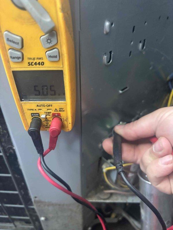 Completed annual cooling maintenance and tune-up on residential air conditioning system. Performed comprehensive electrical diagnostics using clamp meter, recording voltage reading of 506V and capacitor measurement of 29.14 MFD. Inspected all electrical connections, tested capacitor functionality, and verified proper system operation to ensure optimal cooling performance for the season.