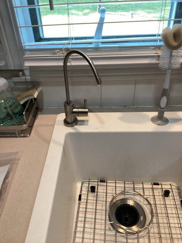 Completed trim kit repair and installation at residential property. Serviced kitchen sink area including faucet assembly with gooseneck spout and soap dispenser, ensuring proper mounting and seal integrity. Addressed bathroom bathtub plumbing fixtures including chrome spout, shower valve with escutcheon plate, and drain assembly to restore proper function and appearance.