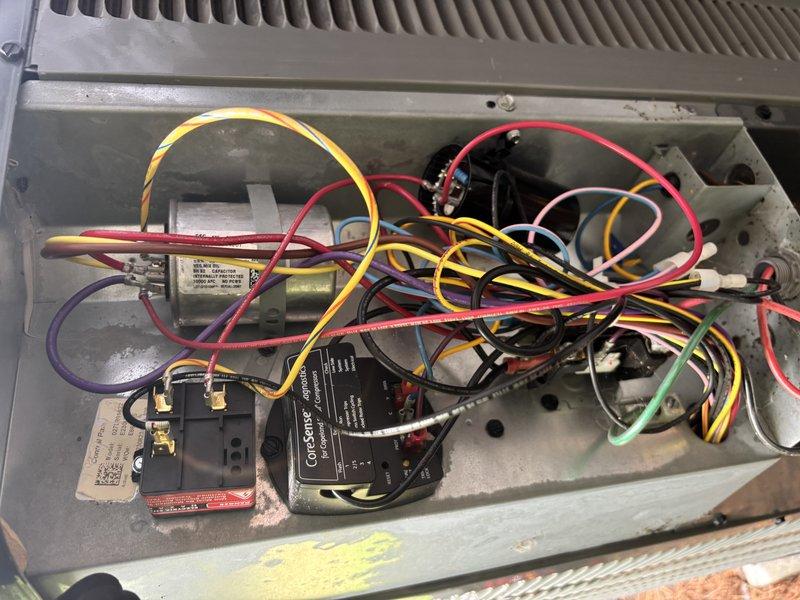 Completed annual cooling maintenance on 2021 EnergiAir system under active warranty coverage. Performed comprehensive system inspection including electrical testing with clamp meter to verify proper amperage draw and voltage levels. Inspected control board, ColdStart component, and all electrical connections within the unit housing. All wiring, relays, and control modules found to be functioning within normal parameters. System operating efficiently with no deficiencies noted at time of service.
