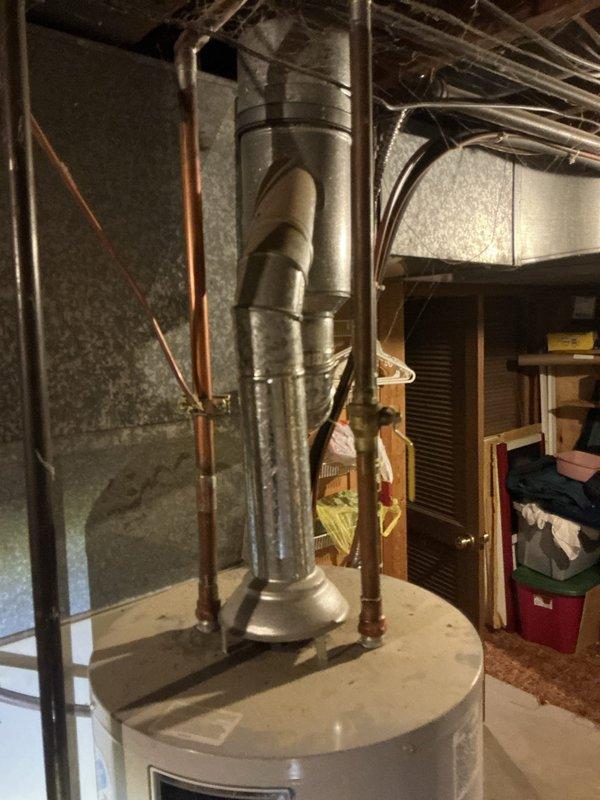 Provided comprehensive estimate for complete HVAC system replacement including 16-year-old furnace and air conditioning unit with confirmed refrigerant leak in evaporator coils, along with aging water heater replacement to prevent future emergency situation. Assessed existing basement installation with current ductwork configuration, humidifier accessory, and copper plumbing connections to determine proper equipment sizing and replacement specifications for all three major mechanical systems.