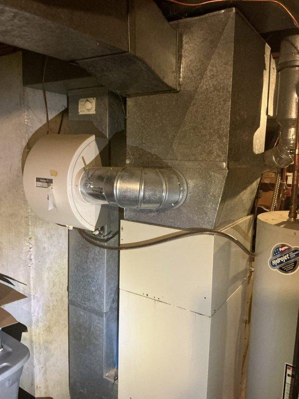 Provided comprehensive estimate for complete HVAC system replacement including 16-year-old furnace and air conditioning unit with confirmed refrigerant leak in evaporator coils, along with aging water heater replacement to prevent future emergency situation. Assessed existing basement installation with current ductwork configuration, humidifier accessory, and copper plumbing connections to determine proper equipment sizing and replacement specifications for all three major mechanical systems.