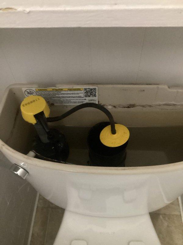 Responded to a complete toilet failure in a 98-year-old home where the tank's internal fill valve and flush mechanism had malfunctioned after months of intermittent operation and failed DIY repair attempts. Replaced all internal tank components including the deteriorated fill valve assembly with dual float mechanisms and associated hardware, restoring full functionality to the affected toilet while confirming all other plumbing fixtures remained operational.