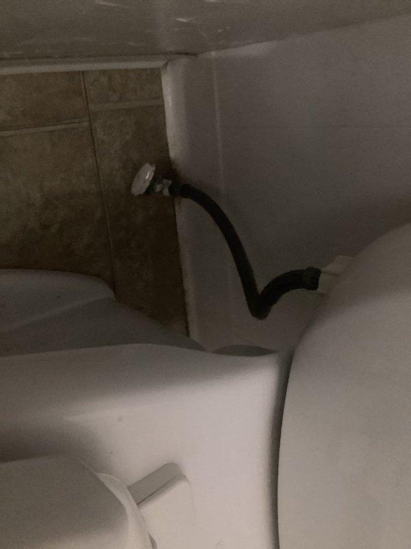 Responded to a complete toilet failure in a 98-year-old home where the tank's internal fill valve and flush mechanism had malfunctioned after months of intermittent operation and failed DIY repair attempts. Replaced all internal tank components including the deteriorated fill valve assembly with dual float mechanisms and associated hardware, restoring full functionality to the affected toilet while confirming all other plumbing fixtures remained operational.