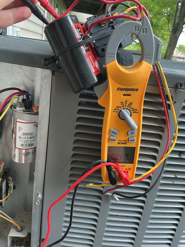 Completed annual cooling maintenance on EnergiAir system with 2023 compressor. Performed electrical diagnostics using clamp meter, verifying capacitor operation with reading of 380.0. Inspected outdoor condensing unit components including capacitor, wiring connections, and ventilation grilles. All electrical components tested within normal operating parameters. Updated best contact number to 616-453-6099. System operating properly with no deficiencies noted. Warranty valid through May 2028.