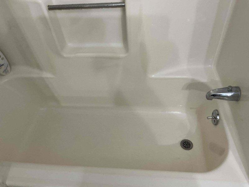 Performed water heater tune-up and comprehensive inspection of water softener system and under-sink plumbing components. Verified proper operation of garbage disposal, P-trap drainage assembly, and water filtration system with all connections secure and functioning correctly. Water supply to softener was restored after confirming system integrity and proper installation of all plumbing components.