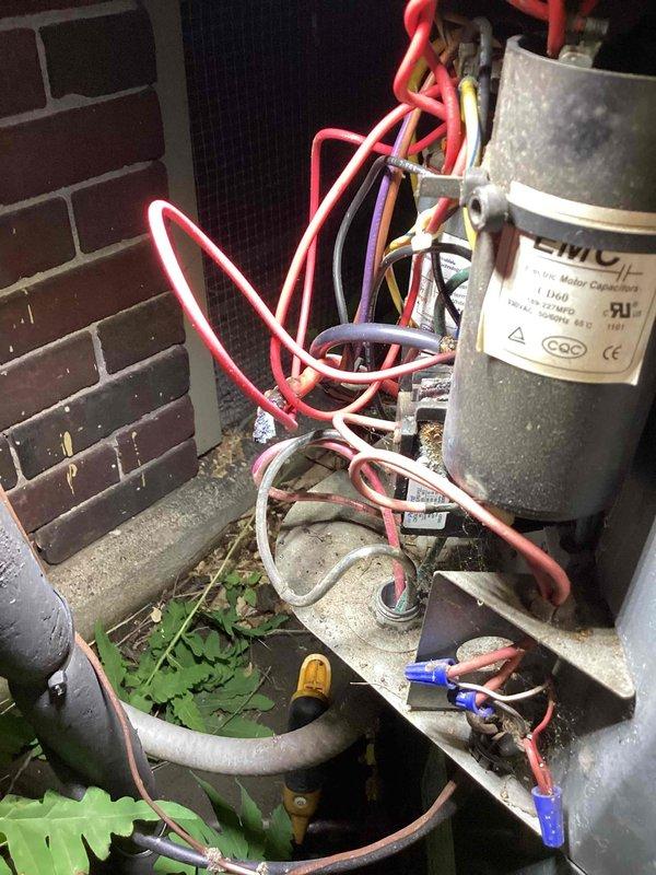 Responded to no cooling call and found outdoor condensing unit not operating. Upon inspection, discovered failed dual run capacitor preventing compressor and condenser fan motor from starting. Capacitor tested at zero microfarads, well below manufacturer specifications. Replaced defective capacitor with new OEM-equivalent dual run capacitor rated to match system requirements. Verified all electrical connections were secure and properly terminated. Started system and confirmed compressor and condenser fan motor operation. Measured operating amperage within normal parameters. Unit now cooling properly with all components functioning as designed.