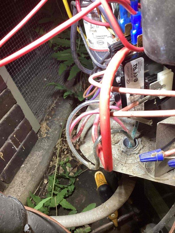 Responded to no cooling call and found outdoor condensing unit not operating. Upon inspection, discovered failed dual run capacitor preventing compressor and condenser fan motor from starting. Capacitor tested at zero microfarads, well below manufacturer specifications. Replaced defective capacitor with new OEM-equivalent dual run capacitor rated to match system requirements. Verified all electrical connections were secure and properly terminated. Started system and confirmed compressor and condenser fan motor operation. Measured operating amperage within normal parameters. Unit now cooling properly with all components functioning as designed.