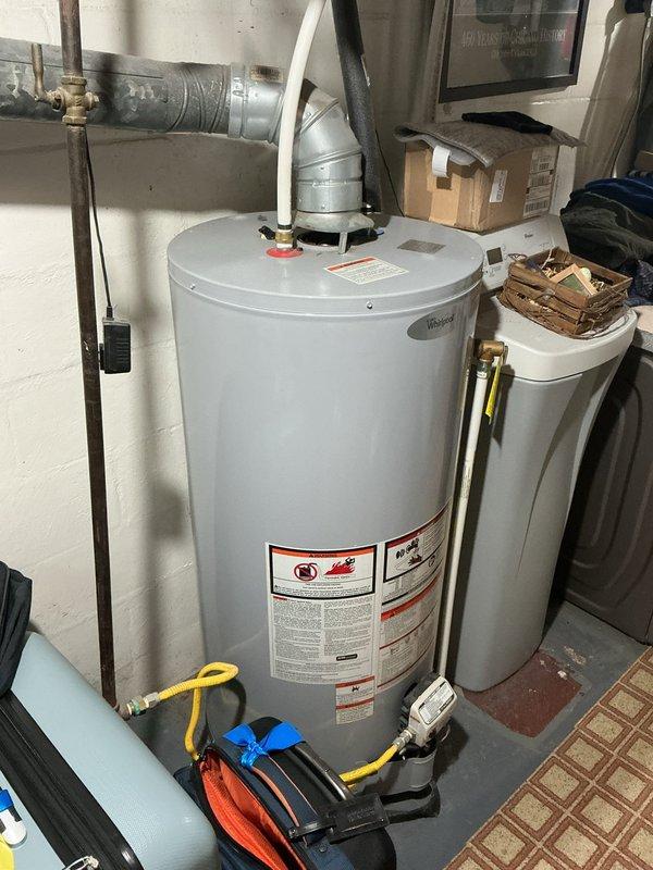 Completed annual cooling maintenance on EnergiAir system (WT 08-2035, 0 years old). Performed comprehensive tune-up including inspection of outdoor condenser unit, verified proper electrical connections and refrigerant levels, cleaned condenser coils, and tested system operation. Unit operating within normal parameters with no deficiencies noted at time of service.