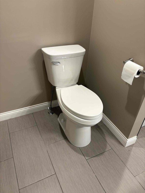 Successfully installed two Gerber Viper Edge hi-rise elongated toilets in accordance with quoted specifications. Both units were properly set on wax ring seals with secure flange connections, tested for leaks, and confirmed fully operational.