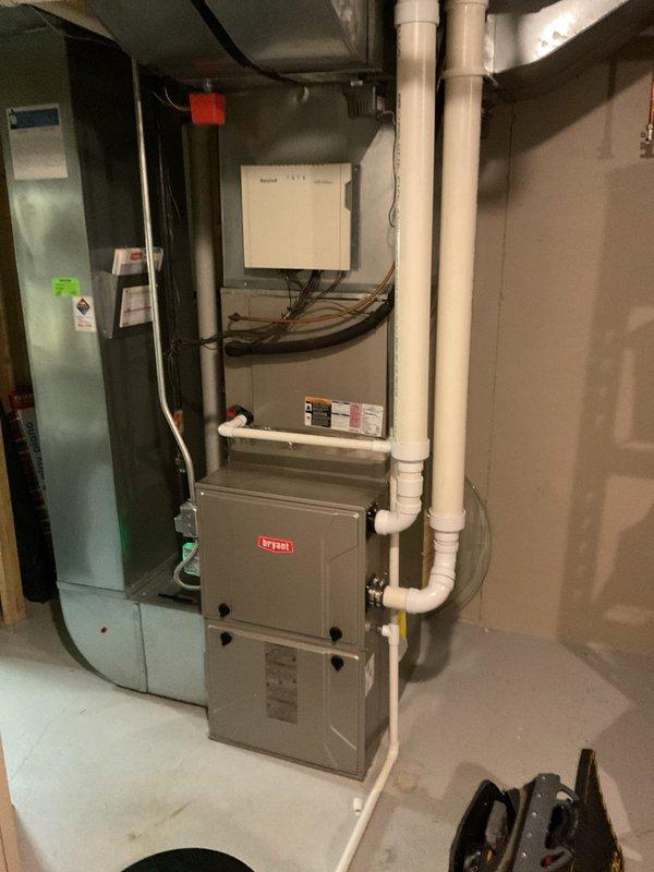 Responded to cooling complaint on 15-year-old Carrier system that was not maintaining temperature setpoint. Unit had previously received approximately 4 pounds of refrigerant and dye during tune-up service in June. Performed diagnostic evaluation of outdoor condenser unit and indoor air handler system. Inspected condenser coil condition, verified electrical connections, and checked refrigerant pressures. System evaluation revealed continued refrigerant loss since previous service visit when dye was added to aid in leak detection. Located active refrigerant leak using UV light inspection of previously injected dye. Recovered remaining refrigerant from system per EPA regulations. Performed necessary leak repair and pressure tested system to verify integrity. Evacuated system to proper vacuum levels and recharged with manufacturer-specified refrigerant quantity. Verified proper system operation including temperature split, amperage draw, and cycling behavior. Unit operating within normal 