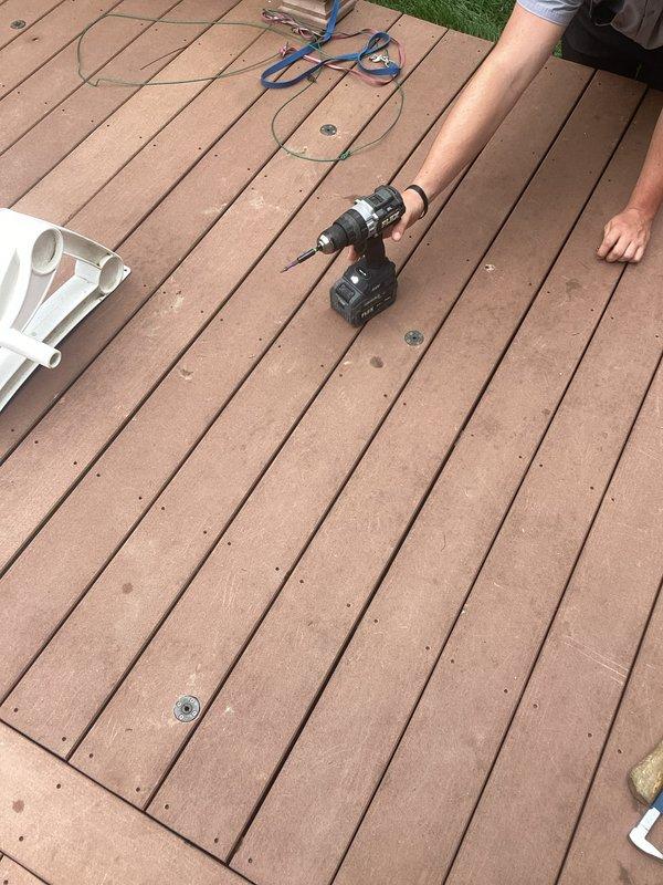 Responded to gas leak service call at residential property with 40-year-old gas infrastructure. Inspected gas pipe located in crawl space beneath exterior wooden deck that services swimming pool heater. Utility company had previously shut off gas supply due to confirmed leak. Accessed work area by removing deck boards using cordless drill to expose affected piping. Performed thorough inspection of gas line routing under deck structure and documented conditions with photographs. Assessed leak location and surrounding pipe condition to determine repair requirements for restoring safe gas service to pool heater equipment.