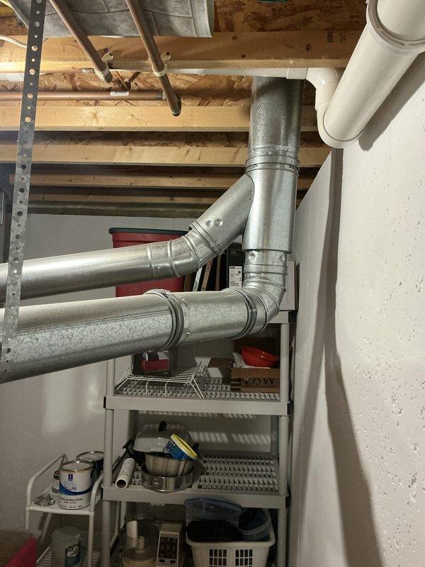 Conducted comprehensive sales estimate for complete HVAC system replacement at residential property. Evaluated existing Lennox furnace installation in utility room, assessed current ductwork configuration including metallic trunk lines and branch connections, and documented equipment specifications and operating conditions. Photographed existing equipment layout, condensate drainage lines, venting systems, and overall mechanical room configuration to provide accurate proposal for new furnace and air conditioning system installation.