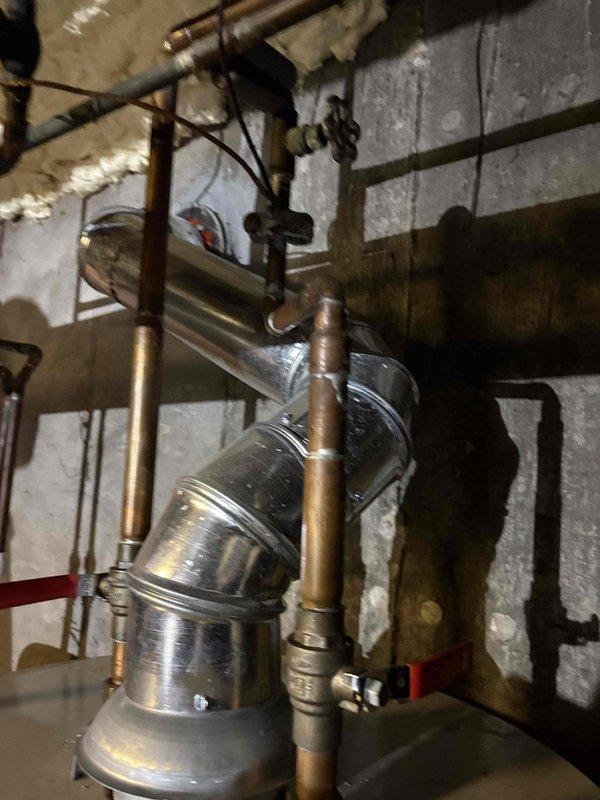 Responded to emergency water leak at residential property where water heater was actively leaking from top connections. Upon arrival, confirmed 6-year-old Bradford White water heater with fast leak originating from upper plumbing connections. Advised homeowner to cease water usage to minimize water damage while assessment was conducted. Documented equipment condition, manufacturer specifications, and leak source with photographic evidence showing copper supply lines, brass fittings, and vent connections at top of unit. Water heater warranty expires 08-10-2026. Provided customer with contact information for follow-up service coordination.