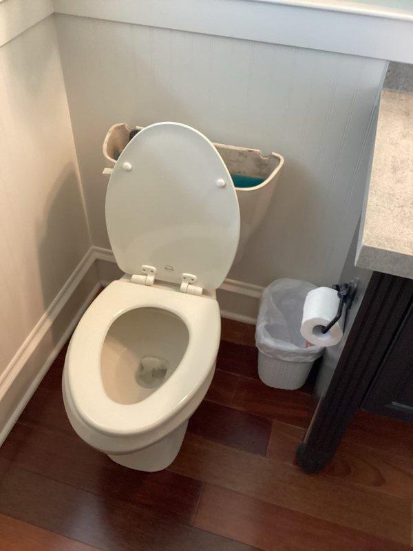 Responded to guest bathroom plumbing concern regarding white foam material protruding from drain pipe connections beneath sink. Upon inspection, found excessive expanding foam sealant had been previously applied around PVC drain assembly joints, creating irregular bulbous formations at pipe connections. Assessed toilet operation as requested and confirmed proper functionality with no issues identified.
