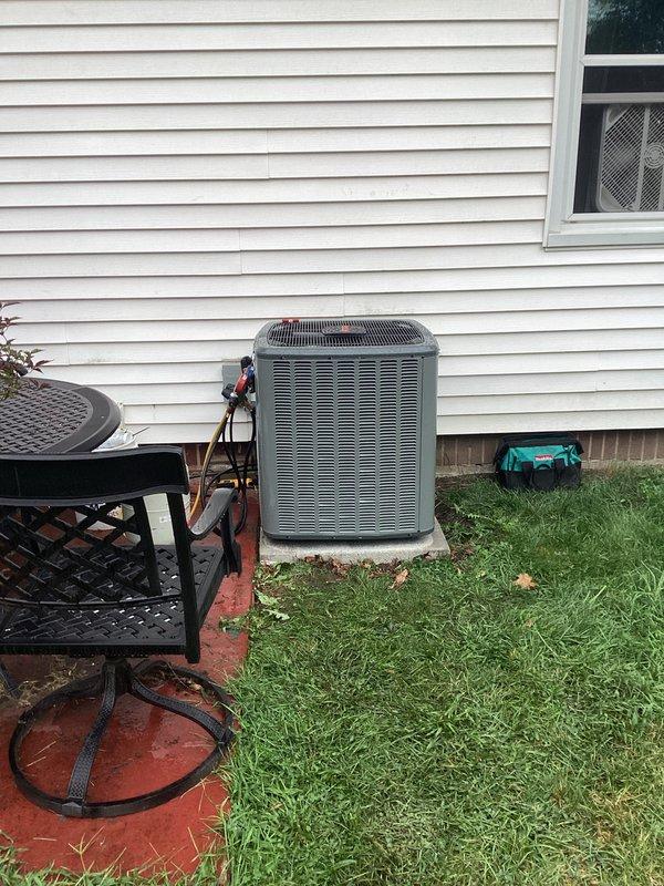 Completed full air conditioning system replacement including outdoor condenser unit and indoor air handler. Installed new condenser on existing concrete pad with proper refrigerant line connections and electrical wiring. Replaced air handler unit in mechanical room with new ductwork connections and pleated filtration system. System tested and confirmed operational upon completion.