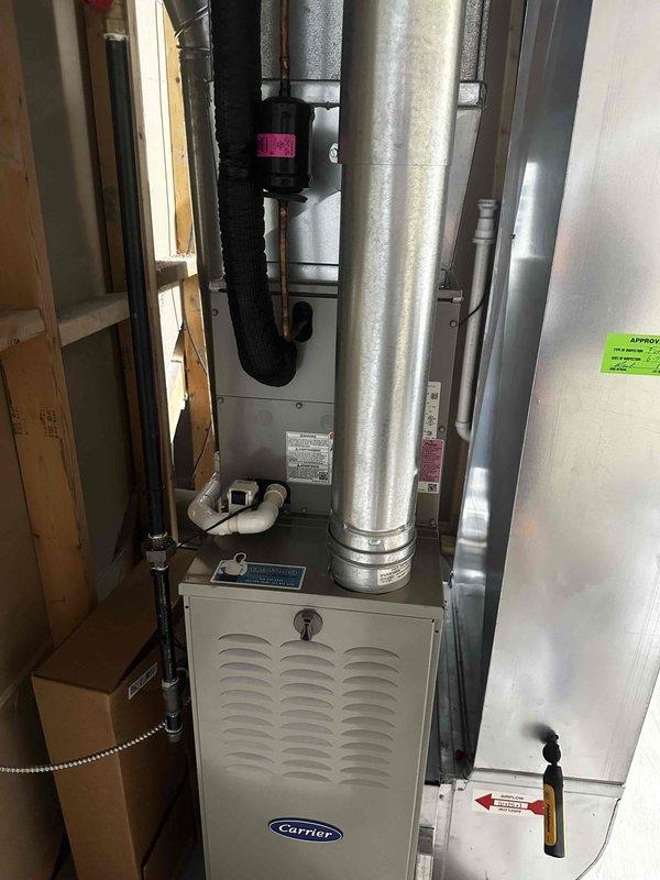 # HVAC Evaporator Coil Replacement

Returned to property to complete previously quoted evaporator coil replacement on Carrier furnace system. Removed access panels and disconnected existing evaporator coil from refrigerant lines and condensate drain system. Carefully extracted old coil from cabinet while preserving surrounding ductwork and connections. Installed new evaporator coil, reconnected copper refrigerant lines with proper brazing techniques, and secured all fittings. Reestablished condensate drain connections using PVC piping. Verified all connections were secure, system was properly sealed, and unit was ready for operation. Work completed as quoted.