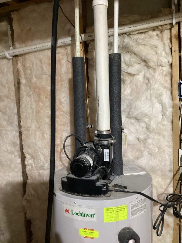 Completed comprehensive water heater tune-up on 15-year-old Lochinvar ENER-LOCK unit. Performed full system flush and tank drainage, which had not been completed in several years, removing accumulated sediment to restore efficiency and extend equipment lifespan. Inspected all connections, pressure relief valve, circulator pump assembly, and verified proper operation of all components.