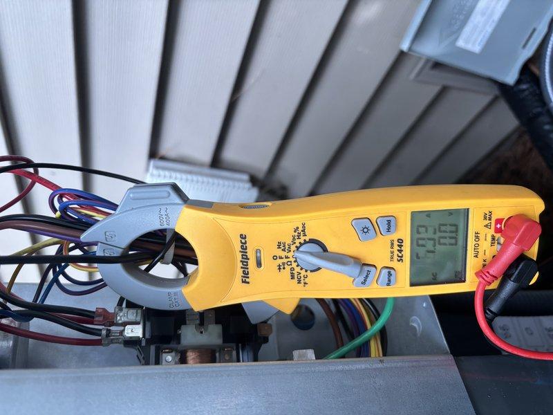 Responded to no cooling call on new Daikin system where indoor blower operated but outdoor unit failed to start. Upon inspection, identified electrical issue preventing outdoor unit communication. Verified voltage specifications on unit nameplate, performed electrical diagnostics using clamp meter to test control circuit and power supply to outdoor unit, and restored proper system operation.