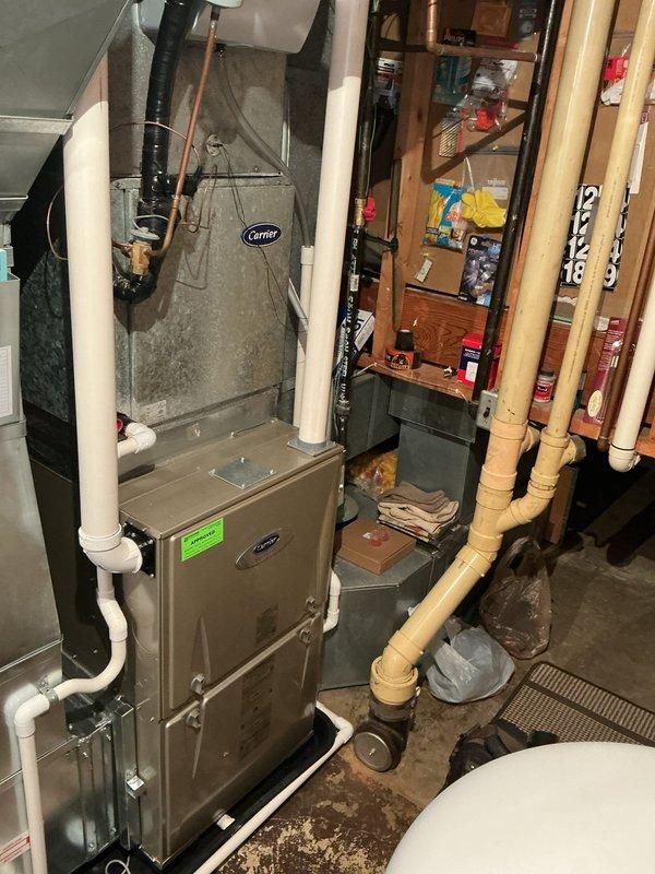 Completed annual cooling maintenance on 25-year-old Carrier system. Performed comprehensive inspection of indoor and outdoor units, checked refrigerant levels and pressures, cleaned condenser coils, verified electrical connections, tested capacitors and contactors, inspected ductwork and airflow, and confirmed proper system operation and cooling performance.