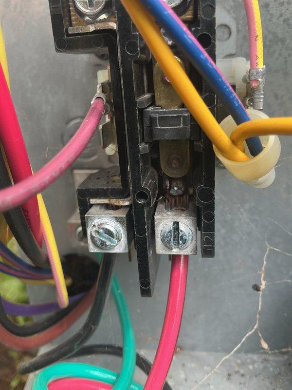 Completed annual cooling system tune-up on 2018 unit under EnergiAir warranty coverage. Performed comprehensive inspection of electrical connections and terminal blocks, documenting wiring configuration and component condition. All electrical terminals were found secure with proper wire connections; system operating within normal parameters with no immediate service needs identified.