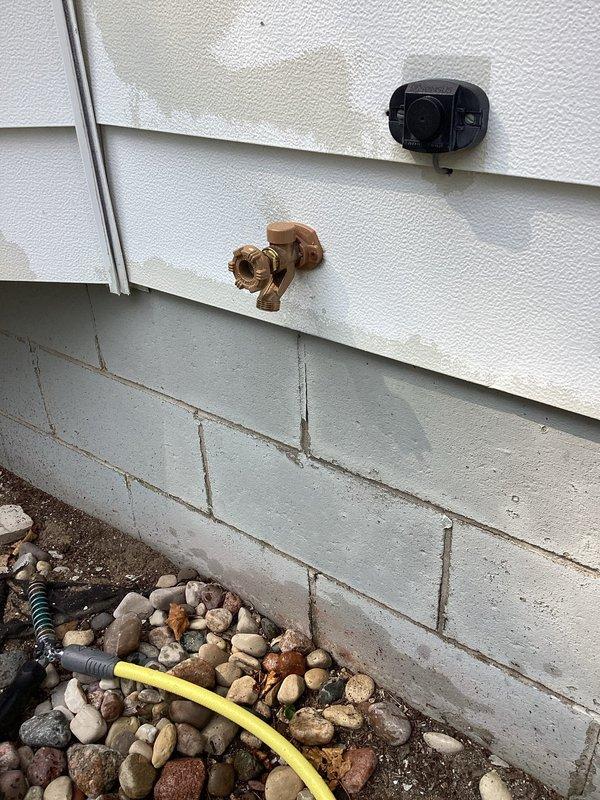 Replaced two outdoor hose bibs on exterior wall of residence. Removed old corroded spigots and installed new frost-free sillcocks with proper mounting and sealing to prevent water intrusion through siding. Coordinated work timing with electrician who was servicing nearby electrical fixtures during same visit.