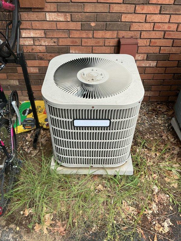Responded to no-cooling call on Goodman air conditioning system over 10 years old. Upon arrival, found unit experiencing power and thermostat communication issues. Inspected outdoor condenser unit and traced electrical connections to attic junction point. Identified loose wire connections at thermostat wiring junction causing intermittent power loss to system. Secured all wire connections, verified proper voltage at thermostat and condenser unit, and tested system operation through complete cooling cycle. Unit restored to normal operation with proper thermostat control and full cooling capacity.