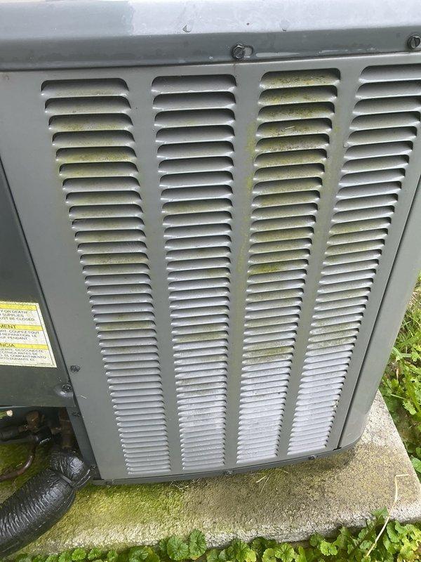 Completed annual cooling maintenance on outdoor condensing unit under 4-year EnergiAir warranty program. Performed comprehensive system inspection, documenting unit condition with exterior showing moderate dirt accumulation on ventilation louvers and minor weathering on cabinet surfaces. Verified proper installation on concrete pad with appropriate clearances, inspected electrical conduit connections, and confirmed all safety labels present and legible. Unit operational and ready for cooling season.