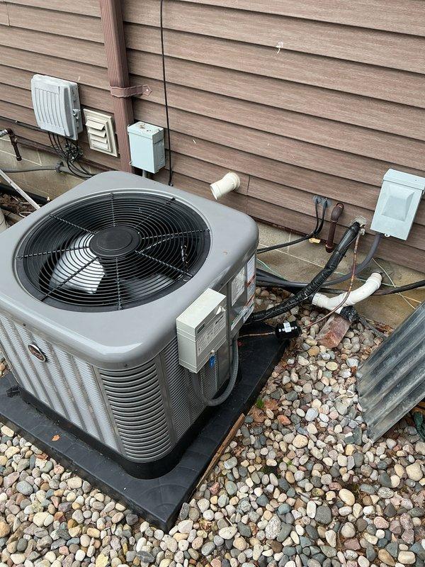 Completed annual cooling maintenance on 2021 Goodman air conditioning system. Performed comprehensive tune-up including inspection of outdoor condenser unit, refrigerant lines, and electrical connections. All components found operating within normal parameters with no issues identified during this preventative maintenance visit.