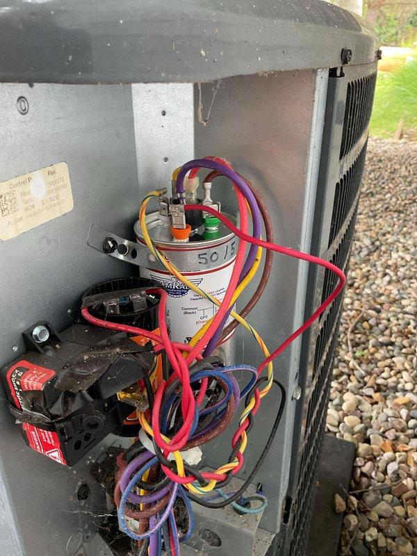 Completed annual cooling maintenance on 2019 Goodman AC system. Performed electrical diagnostics using clamp meter, measuring capacitor microfarad ratings and verifying proper voltage at contactor. Inspected all electrical connections, tested capacitor functionality, and evaluated compressor amperage draw. All components operating within manufacturer specifications; system ready for cooling season.
