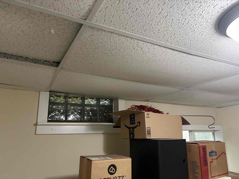 Responded to leaky outdoor spigot causing water intrusion into the interior of a thirty-year-old residence. Located source of leak at exterior hose bib penetration point where water was migrating through the wall assembly into the living space. Per customer request, modified installation to raise spigot approximately twelve inches above grade level to prevent future ground-level exposure and potential freeze damage. Completed repair work and verified no active leakage at interior penetration point or exterior connection.