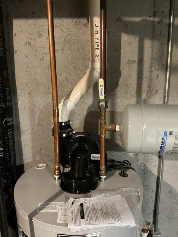 Responded to water leak alarm activation on newly installed water heater system. Upon arrival, inspected the complete installation including water heater, condensate pump assembly, PVC drainage lines, and associated plumbing connections. Verified all pipe connections, fittings, and seals for proper installation and potential leak sources. Tested condensate pump operation and drainage system functionality. Confirmed no active water leaks present; alarm triggered by condensate pump sensor during normal system operation. Reset leak detection alarm and verified proper system operation before departure.
