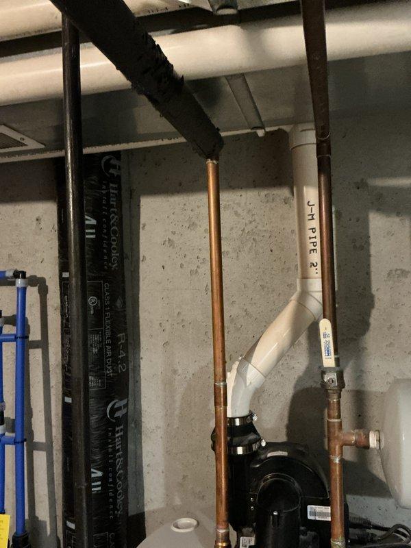 Responded to water leak alarm activation on newly installed water heater system. Upon arrival, inspected the complete installation including water heater, condensate pump assembly, PVC drainage lines, and associated plumbing connections. Verified all pipe connections, fittings, and seals for proper installation and potential leak sources. Tested condensate pump operation and drainage system functionality. Confirmed no active water leaks present; alarm triggered by condensate pump sensor during normal system operation. Reset leak detection alarm and verified proper system operation before departure.