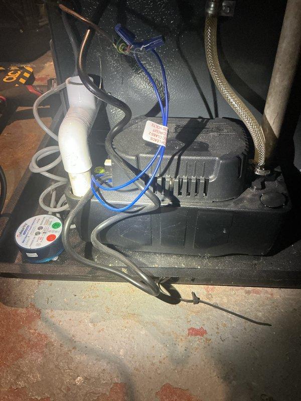 Completed annual cooling maintenance on 16-year-old Rheem system with coil manufactured in 2018. Inspected condensate pump assembly and drainage system, verified proper operation of float switch and discharge lines. Examined exterior refrigerant lines and confirmed copper piping integrity with no visible leaks or damage.