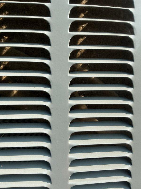 Completed annual cooling maintenance and inspection on residential HVAC system under EnergiAir warranty coverage. Performed comprehensive tune-up including inspection of evaporator coil fins, supply grilles, and air distribution components. System evaluated for proper airflow, refrigerant levels, and overall operational efficiency. Unit found to be operating within normal parameters. Documentation photos captured for service records.