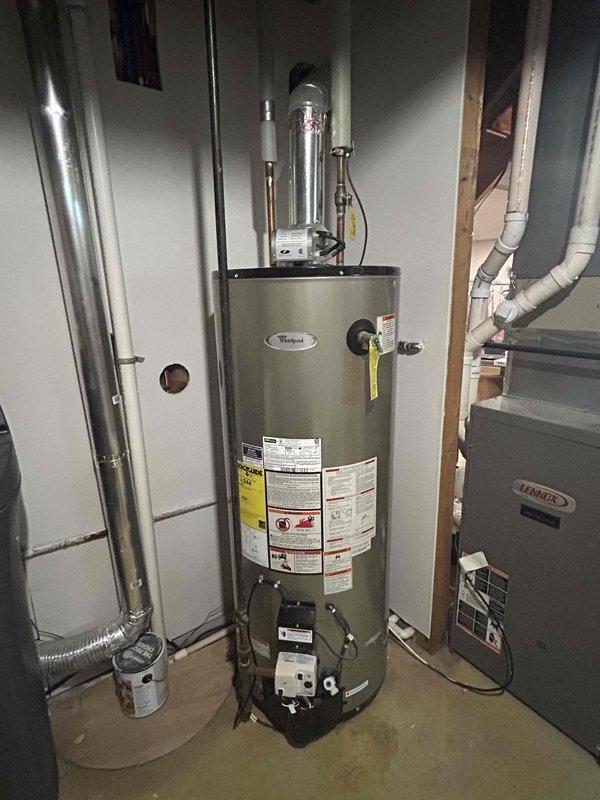Responded to no-heat call on 13-year-old Whirlpool residential water heater that failed to restart following power outage. Upon arrival, inspected unit and found the thermal cutoff switch had tripped due to the power interruption. Reset the thermal safety device, verified proper electrical connections at the control box, tested all wiring for continuity, and successfully restored unit to full operation. Confirmed proper heating cycle and advised monitoring system performance.