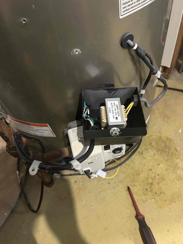 Responded to no-heat call on 13-year-old Whirlpool residential water heater that failed to restart following power outage. Upon arrival, inspected unit and found the thermal cutoff switch had tripped due to the power interruption. Reset the thermal safety device, verified proper electrical connections at the control box, tested all wiring for continuity, and successfully restored unit to full operation. Confirmed proper heating cycle and advised monitoring system performance.