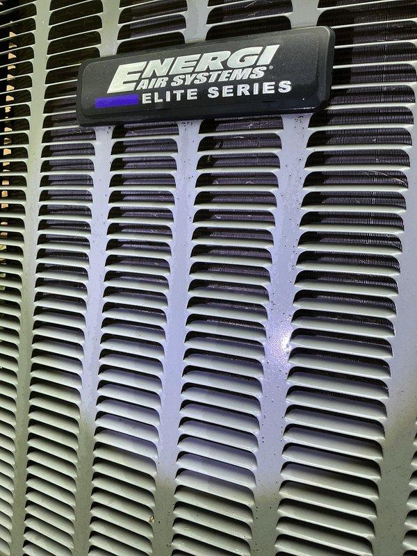 Completed annual cooling maintenance on 8-year-old EnergiAir Elite Series system under warranty through June 2028. Performed comprehensive tune-up including inspection of condenser unit, coil cleaning, refrigerant level verification, and system performance testing. Documented exterior lineset penetration with foam insulation sealant at wall entry point and confirmed unit nameplate and identification details for service records.