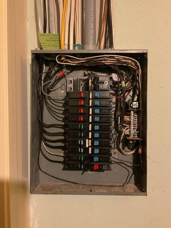 Completed comprehensive electrical club inspection at the property. Thoroughly examined and documented the main electrical service panel, verifying proper circuit breaker installation, wire routing, and neutral bus bar connections. Inspected exterior electrical service equipment including the utility meter, weatherhead assembly, service entrance conduit, and associated junction boxes for code compliance and operational safety.